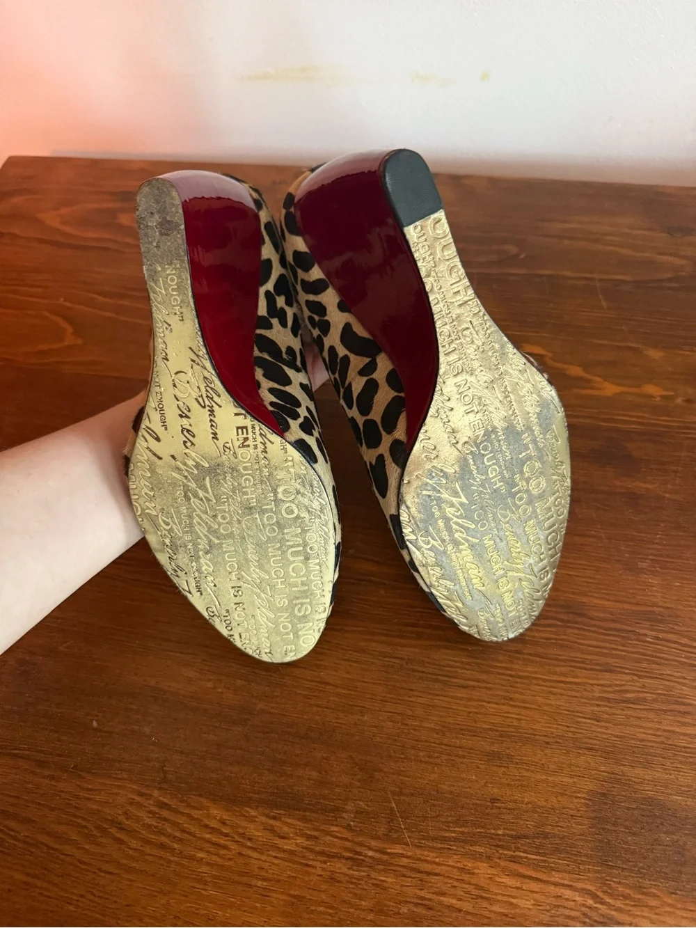 Leopard Print Calf Hair Wedge Pump with Red Heel